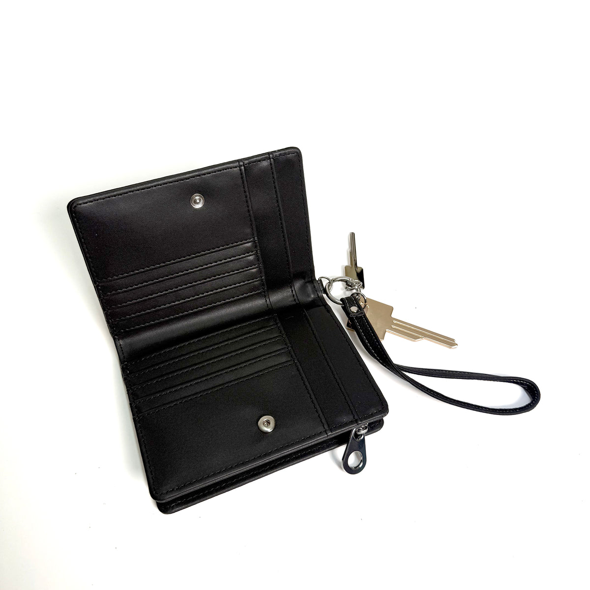 Portafoglio medio Kyoto con tag e polsiera colore nero - Accessori Donna | Le Pandorine